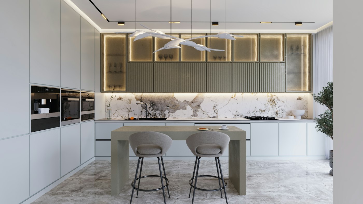 A modular kitchen with fluted sage wall cabinets, a stone backsplash and an island with two stools